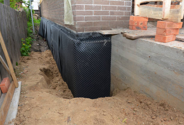 Happy homeowners after waterproofing job in Dunellen